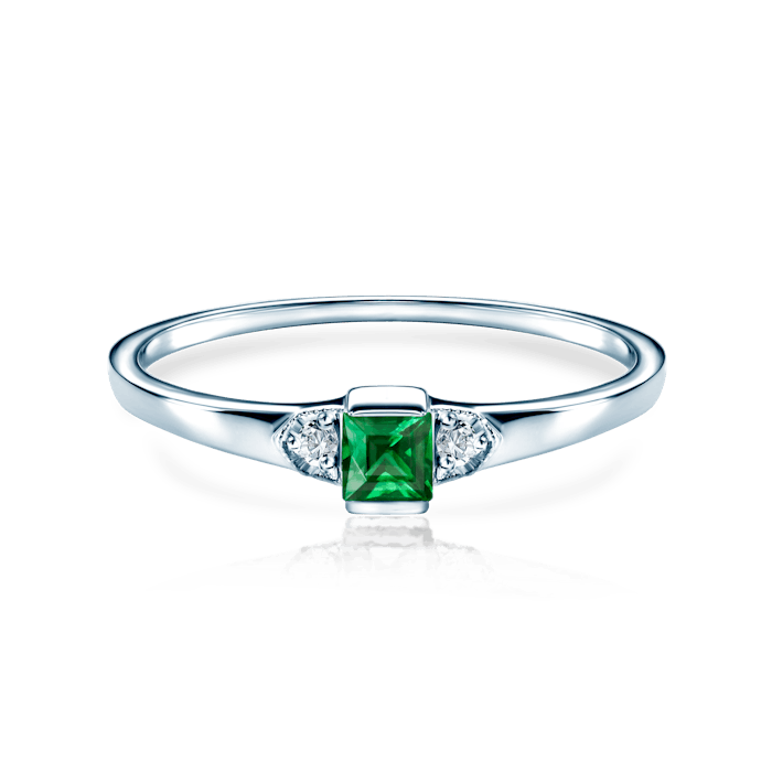 Three-Stone Engagement Ring: white gold, emerald, diamonds