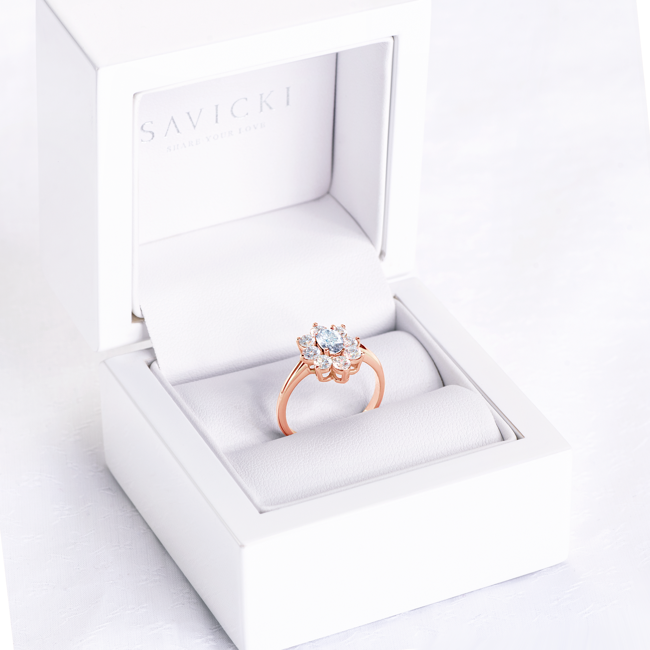 Pierścionek zaręczynowy SAVICKI: różowe złoto, białe szafiry