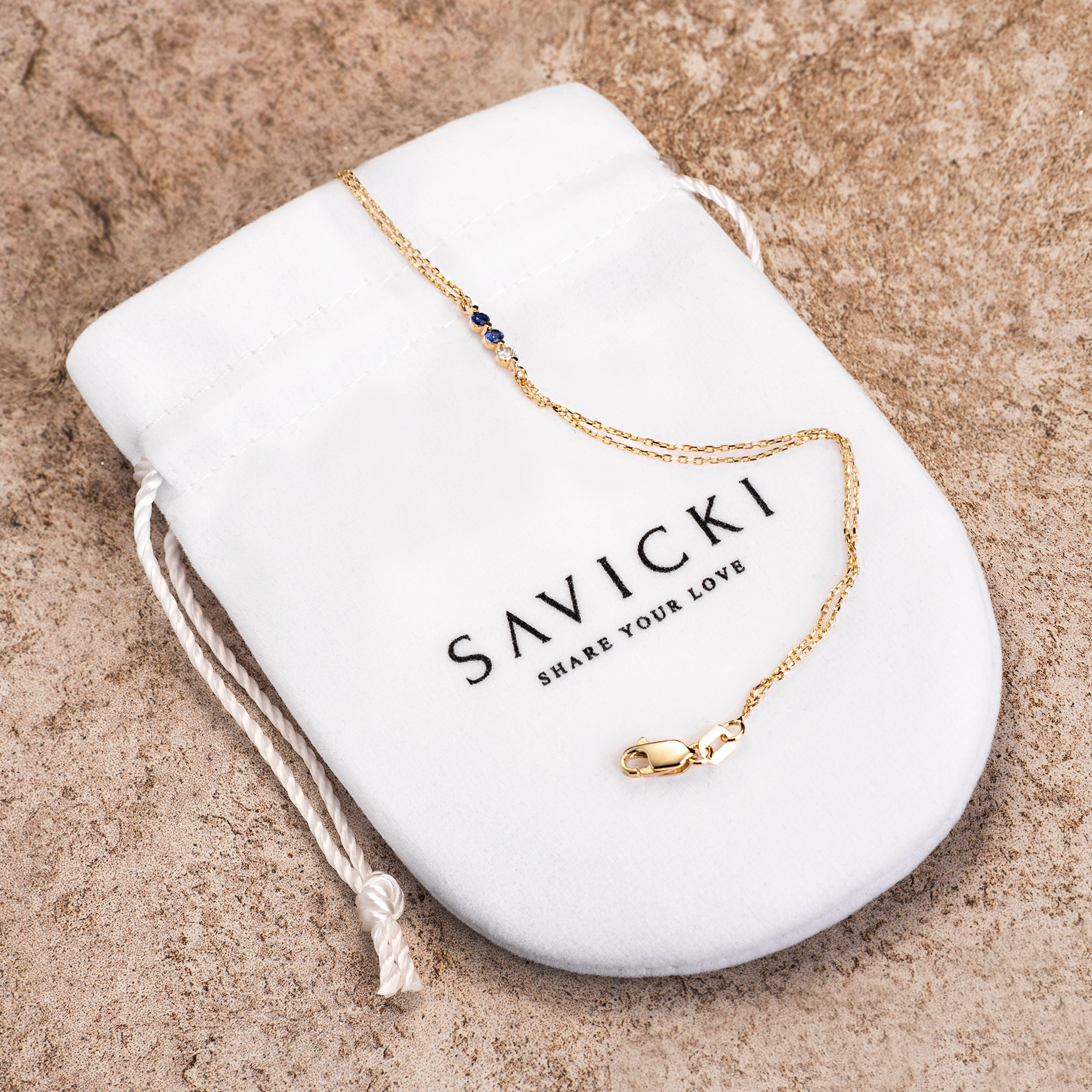 Bransoletka Savicki: złota, niebieskie szafiry, diament