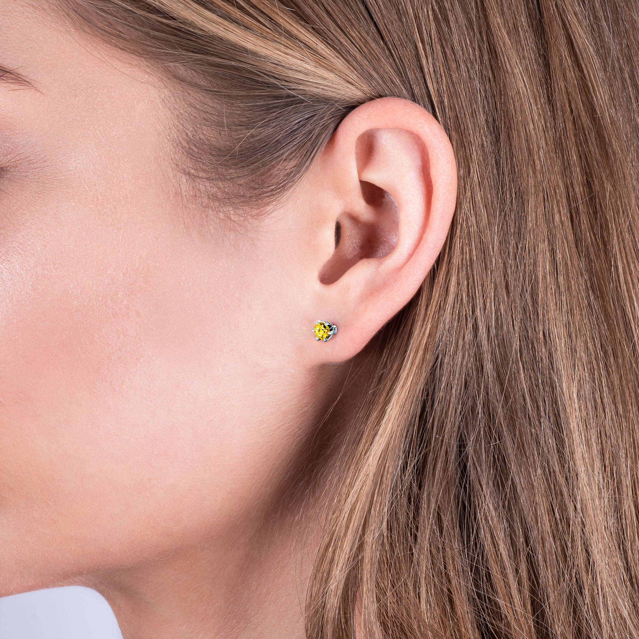 Kolczyki The Journey: białe złoto, żółte szafiry 