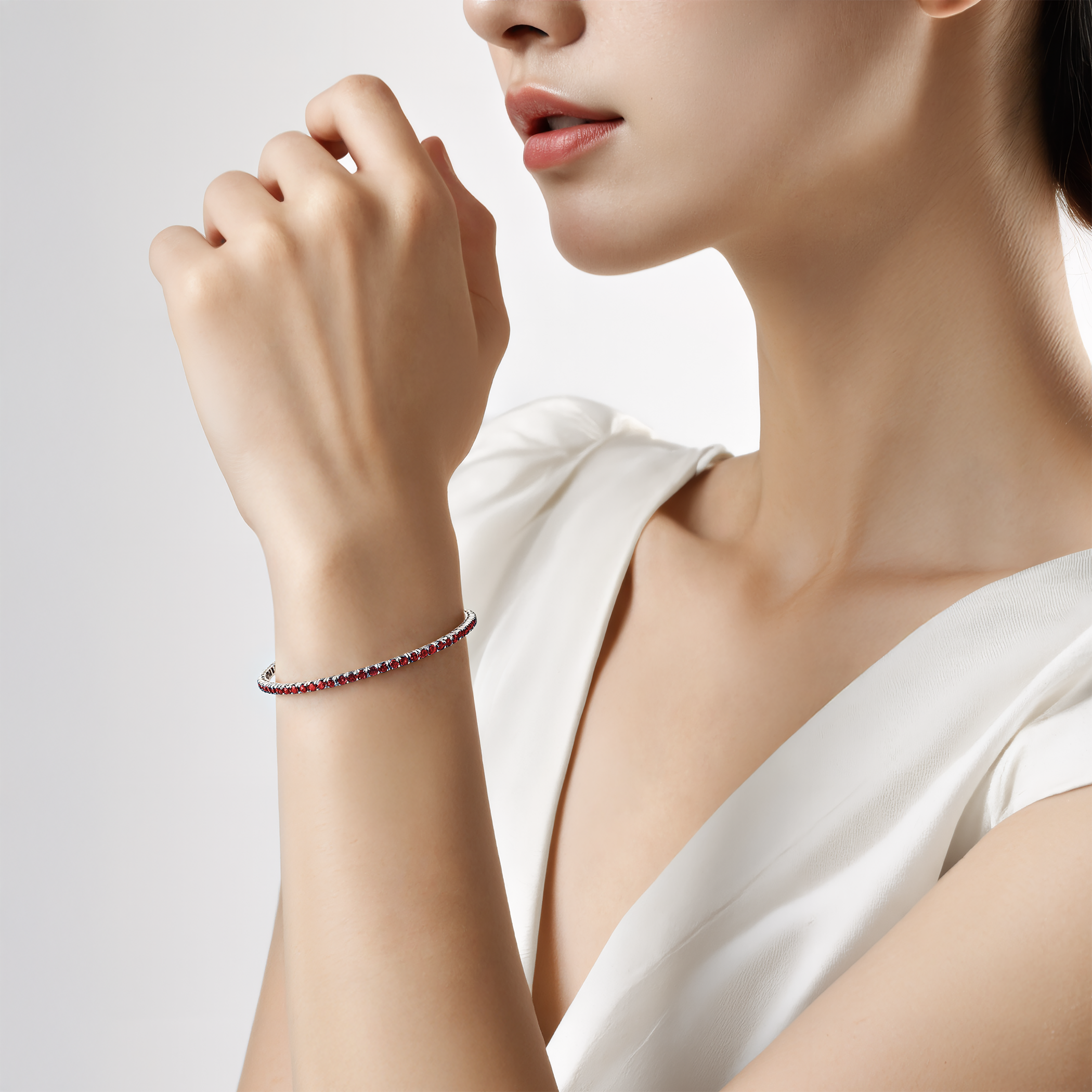 Tennisarmband Luminy 3,0 mm: Weißgold, Rubine