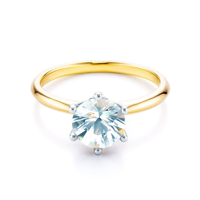 Solitaire Engagement Ring: two colour gold, white sapphire