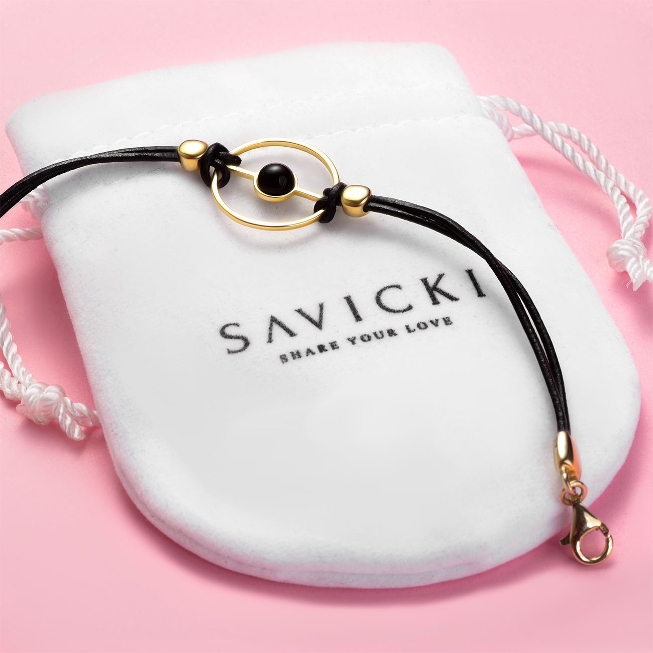 Bransoletka na rzemyku Savicki: srebrna pozłacana, onyks