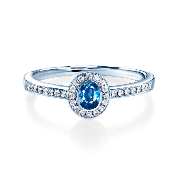 Halo Engagement Ring: white gold, blue sapphire, diamonds
